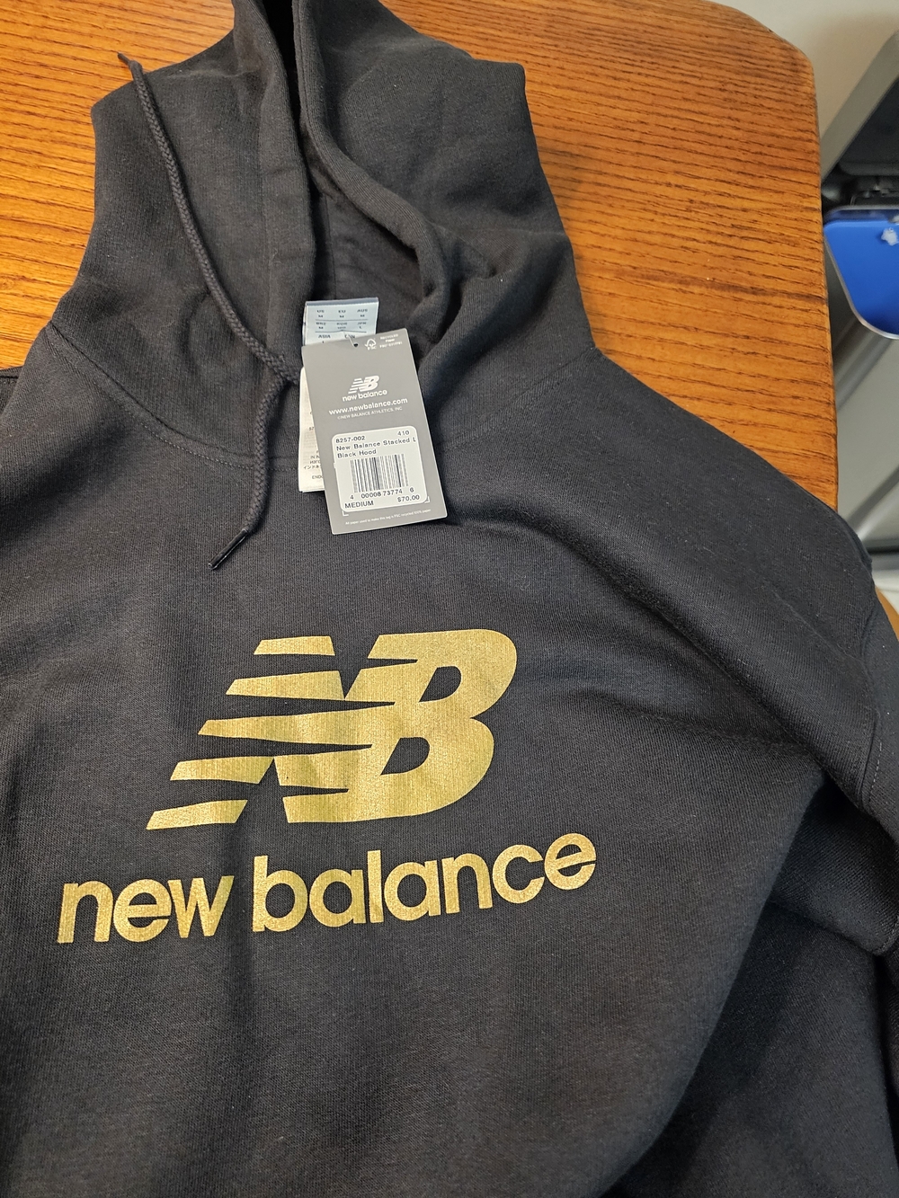 New Balance Black Hoodie with Gold Logo